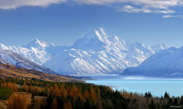 38773AM00: Aoraki / Mount Cook (3754m) and Lake Pukaki in winter. Mt La Perouse (3078m) left, Tasman Valley and Burnett Mountains Range right. Panorama with late autumn colours, Aoraki / Mount Cook National Park, MacKenzie District, New Zealand. Photocredit to be given as Rob Suisted / www.naturespic.co.nz.
